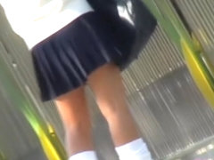 Unsuspecting Asian girl viciously skirt sharked in public.