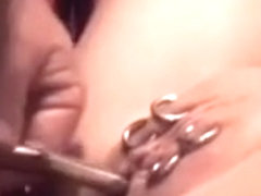 Playing with heavy pierced cum-gap of my wife with speculum