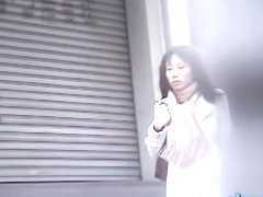 Cold Asian babe in a hurry gets a street sharking.