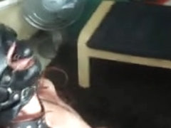 Masked babe with tortured breasts sucks a big dick