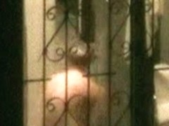 Naked girl in window