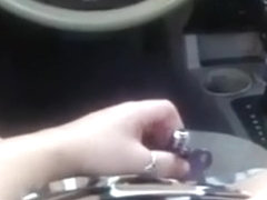 Enchanting my shaved cum-aperture with diminutive sex tool during the time that riding car