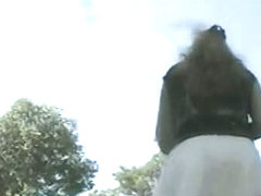 A Brunette and a black hair woman get filmed by a spy cam upskirt