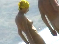 Skillful voyeur smuggled a camera to a nudist beach