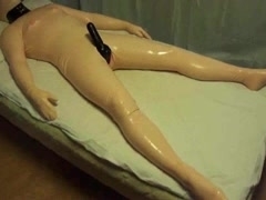 Submissive male transformed to a latex blowup doll