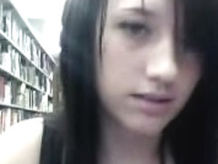 Brunette beauty flashing her amazing tits in the library