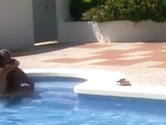 Mature couple fucks in the pool on vacation