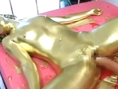 Japanese girl gets painted into gold and fisted