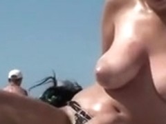 Lusty breasts on beach voyeur videos