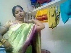 Tamil woman stripping to disclose her breast