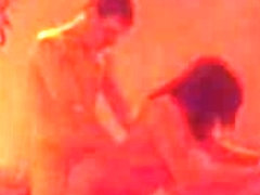 Doggystyle sex in the dim red light makes this vid so sexy