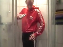 Fully dressed in adidas shower