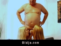 Fat old fart and nasty blonde teens enjoying trio fornication