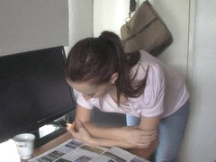 Brunette vixen reading a paper in a down blouse video