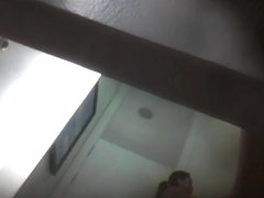 Guy with voyeur cam approached the dressing room spying fem